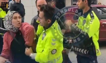Zonguldak’ta bir kadın, eşine ceza yazmak isteyen polislere karşı direndi.